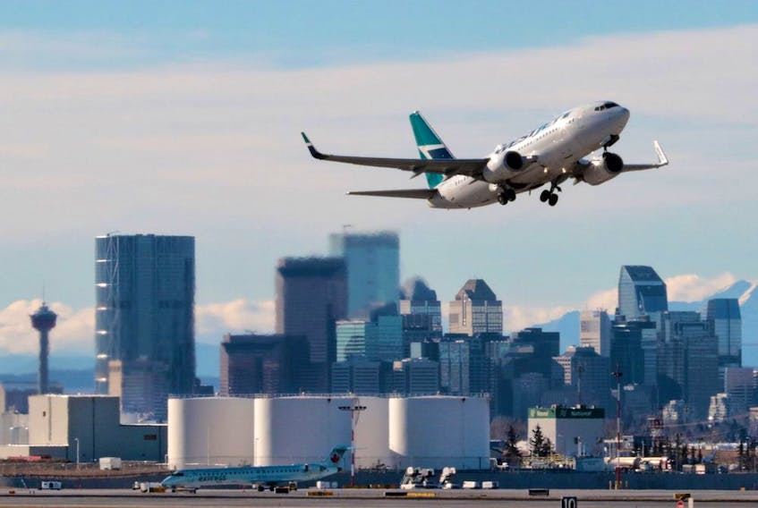 A WestJet airplane taking off from Calgary International Airport.