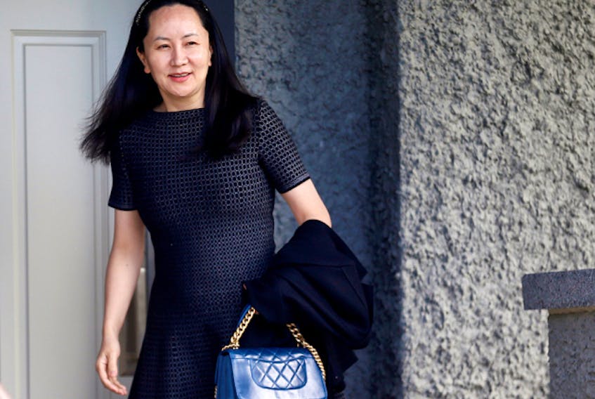  Meng Wanzhou, CFO of Huawei, leaves B.C. Supreme Court in Vancouver on Jan. 23, 2020.
