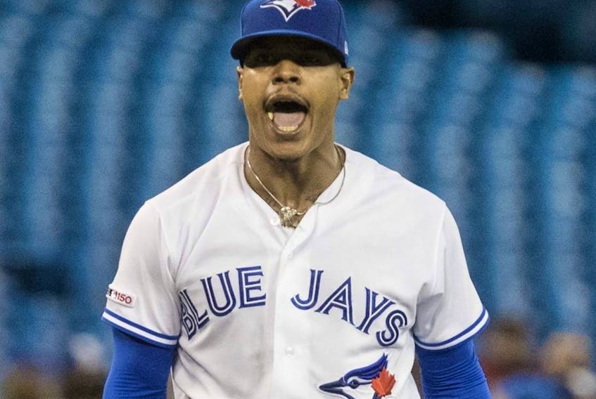 Blue Jays starting pitcher Marcus Stroman reacts after striking out Red Sox batter Xander Boaerts in the third inning of their MLB game in Toronto on Tuesday, May 21, 2019.