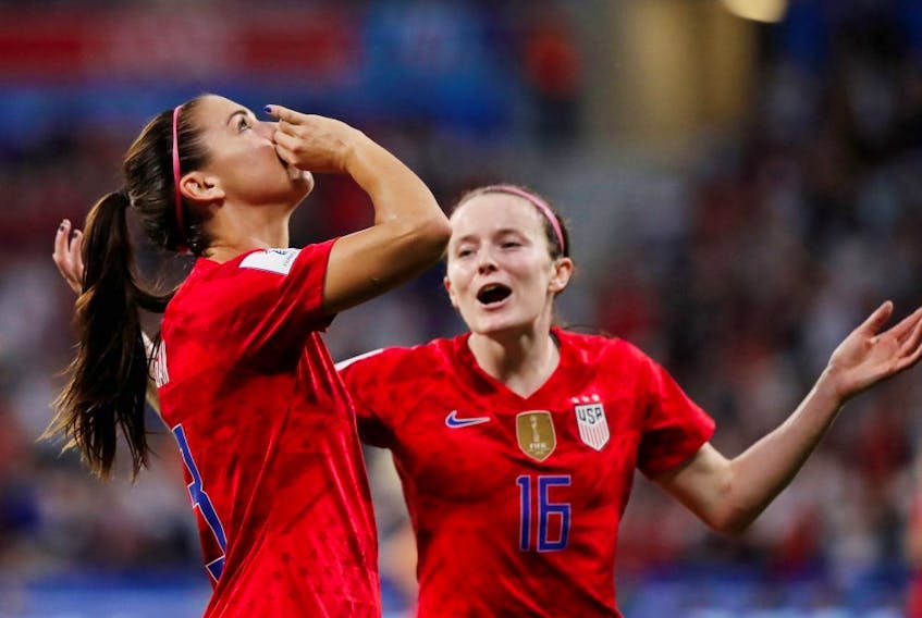 Alex Morgan of the U.S. celebrates scoring their second goal with Rose Lavelle in the semifinal of the 2019 FIFA Women's World Cup at the Stade de Lyon in Lyon, France on Tuesday, July 2, 2019. 