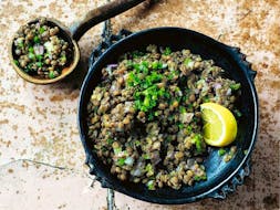 Use green lentils or the small brown ones in this recipe from Yohanis Gebreyesus's Ethiopia: Recipes and Traditions from the Horn of Africa.