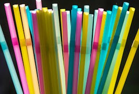 Plastic straws wrapped in paper and plastic forks are seen at a food hall in Washington, D.C. on June 20, 2019.  (ERIC BARADAT/AFP/Getty Images)