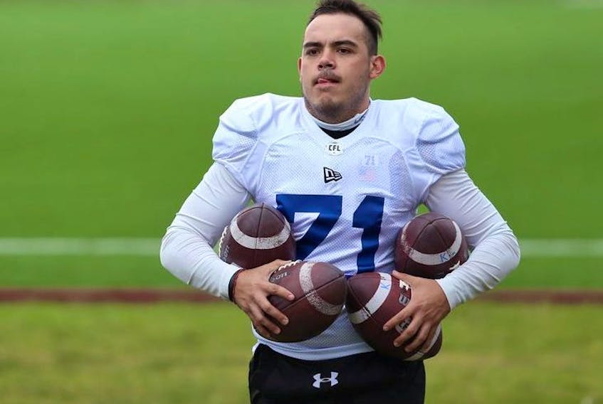 Kicker Gabriel Amavizca Oritiz collects footballs during Winnipeg Blue Bombers rookie camp on the University of Manitoba campus on Wed., May 15, 2019. 