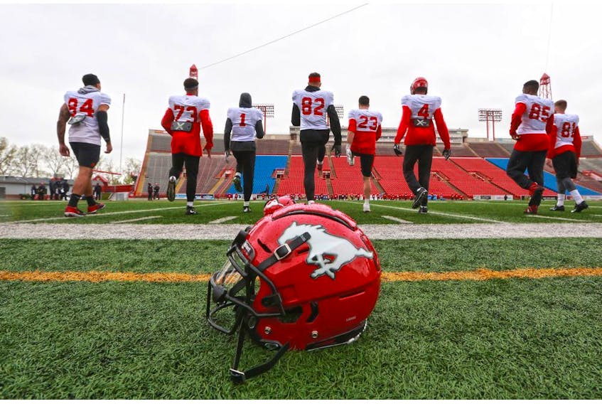 Calgary Stampeders players warm-up during training camp at McMahon Stadium on Tuesday, May 21, 2019. Gavin Young/Postmedia