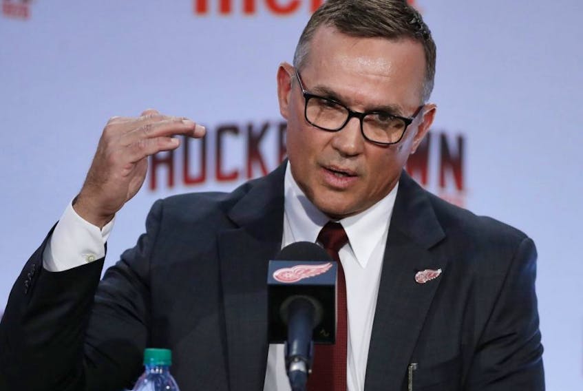 Steve Yzerman answers a question during a news conference where he was introduced as the new executive vice president and general manager of the Detroit Red Wings, Friday, April 19, 2019, in Detroit.