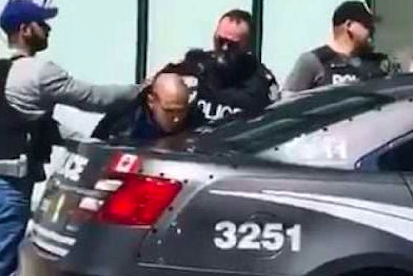 Toronto Police arrest  Alek Minassian, 25, of Richmond Hill, after a last year's van attack on Yonge St. He's accused of killing 10 people.