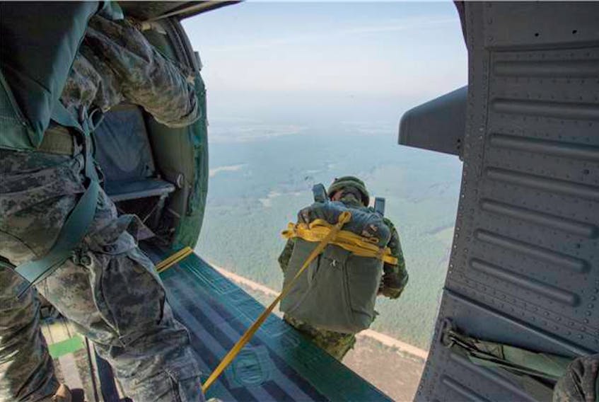 This photo shows Canadian soldiers during parachute training in 2014. Canadian Forces photo.