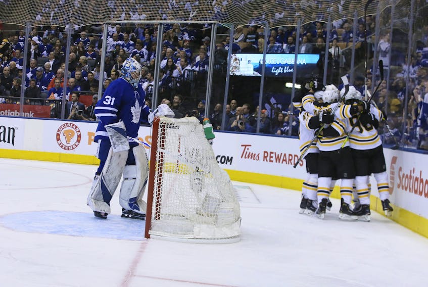 Maple Leafs Frederik Andersen looks on as the Boston Bruins celebrate a goal during Game 4 last night at Scotiabank Arena. (VERONICA HENRI/TORONTO SUN)