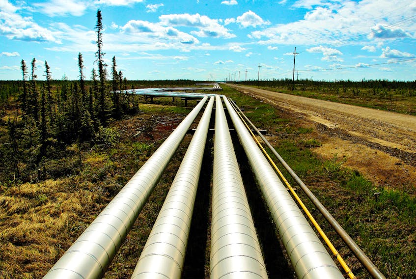  Pipelines run at the McKay River Suncor oil sands in-situ operations near Fort McMurray, Alberta.