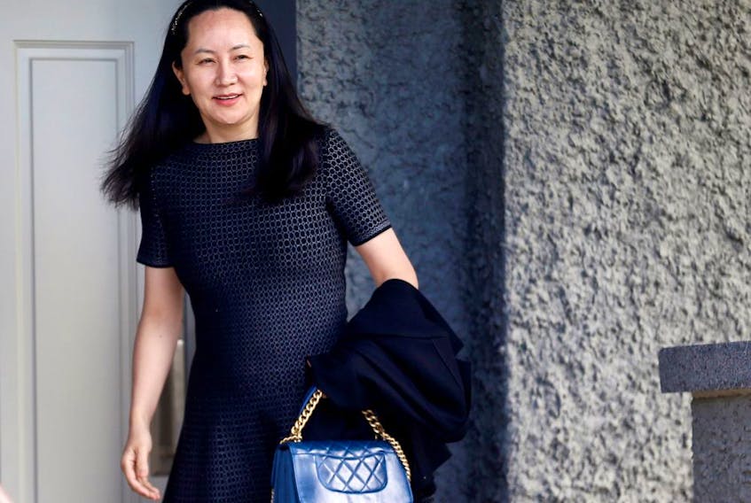  Huawei executive Meng Wanzhou leaves her family home in Vancouver in May 2019.