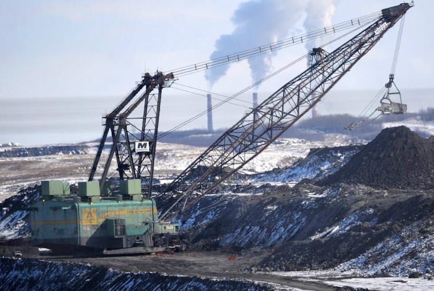A giant drag line works in the Highvale Coal Mine to feed the nearby Sundance Power Plant near Wabamun, Alberta on Friday, Mar. 21, 2014.