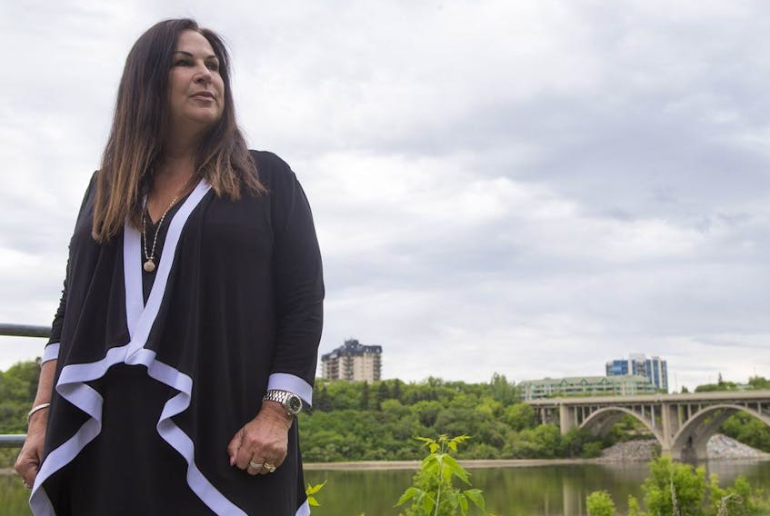 Christine Hrudka, a Saskatoon pharmacist who serves as chair of the Canadian Pharmacists Association stands for a portrait by the South Saskatchewan River in Saskatoon, Sk on Thursday, June 13, 2019.