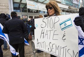 People rally against anti-Semitism in Toronto, March 13, 2017.