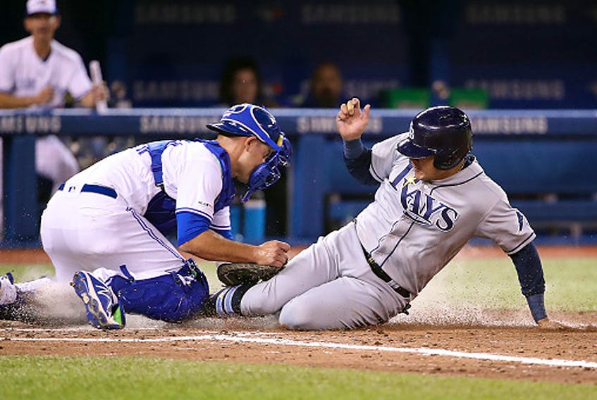 Jonathan Davis of the Toronto Blue Jays steals second base against Daniel Robertson of the Tampa Bay Rays at the Rogers Centre on September 29, 2019 in Toronto. (Mark Blinch/Getty Images)
