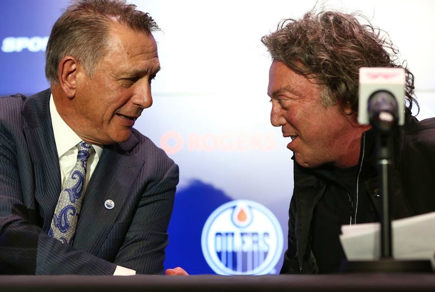Ken Holland (left), general manager of the Edmonton Oilers, shakes hands with Daryl Katz, owner of the Edmonton Oilers, during a press conference announcing Holland's hiring at Rogers Place in Edmonton, on Tuesday, May 7, 2019. Photo by Ian Kucerak/Postmedia