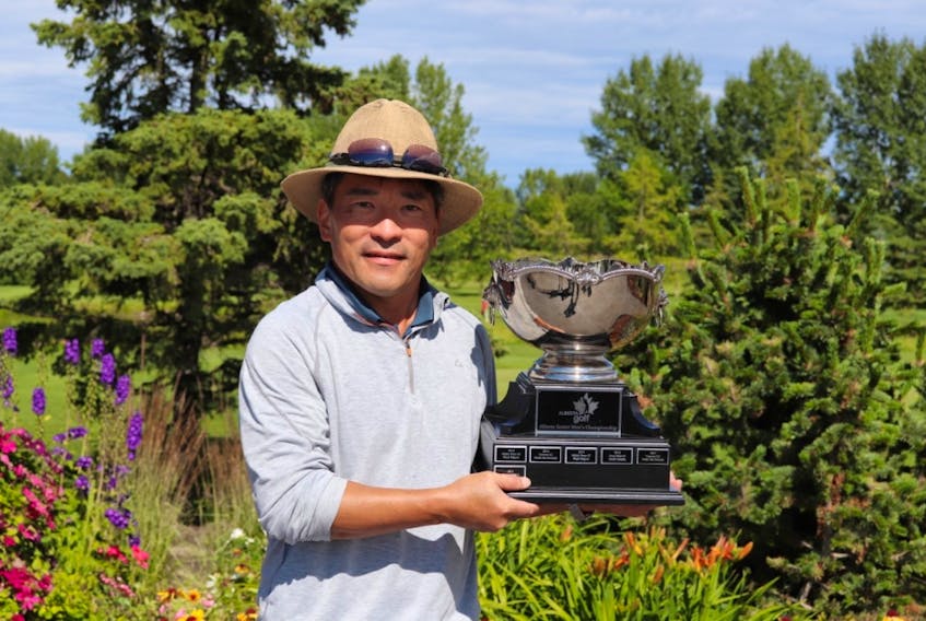Calgary's Grant Oh was all smiles after winning the 2020 Alberta Senior Men's Golf Championship.
