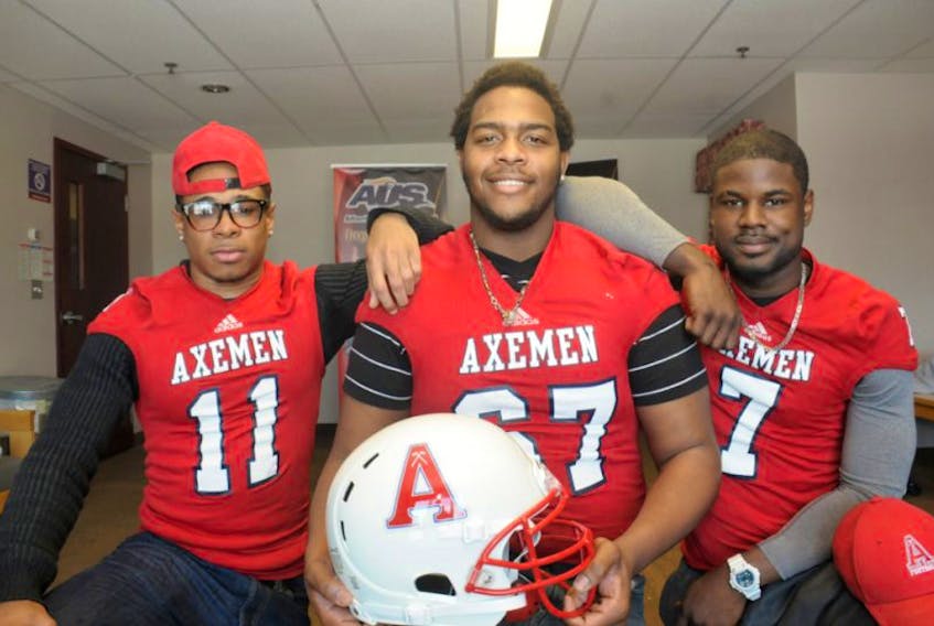 A trio of Holland College Hurricanes football players has signed with the Acadia Axemen. From left are Jaylen McRae, Shelton Williams and Eugene McMinns.
<div><span class="Apple-style-span" style="border-collapse: separate; font-family: Calibri; border-spacing: 0px; font-size: medium;"><span class="Apple-style-span" style="font-family: Calibri, sans-serif; font-size: 14px;"><br /></span></span></div>