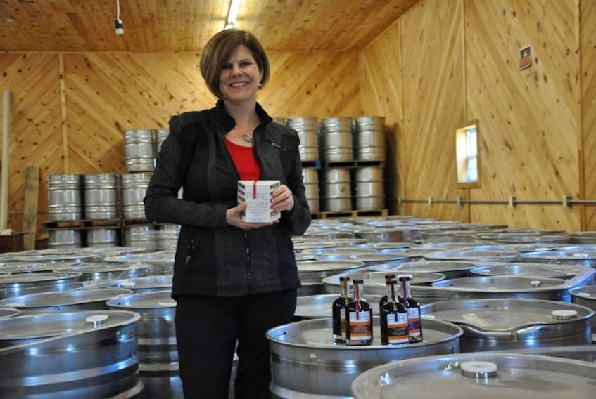 <p>A crew from Hutchinson Acres Maple Syrup in Lake Paul, Kings County had the chance to pitch their unique PURE Infused Maple Syrup line to the stars of CBC’s the Dragons’ Den. The product, displayed in the photo by Leanne Dobrota, can be purchased at Sobeys and various farm markets and wineries in Nova Scotia.</p>