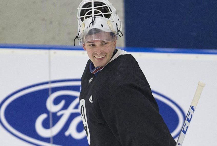 Leafs’ netminder Michael Hutchinson says he’s ready to embrace the role of backup goalie should he beat out rival Michal Neuvirth for the job.  (Stan Behal/Toronto Sun)