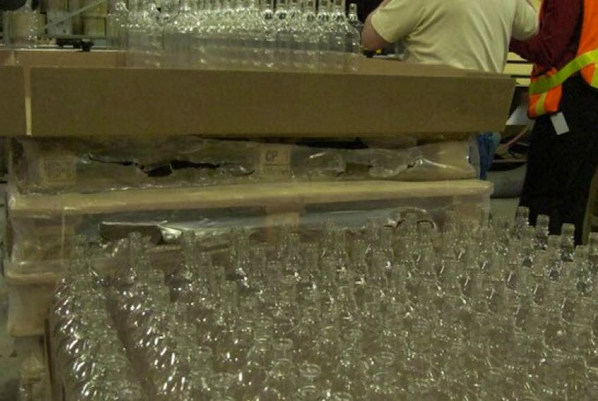 Iceberg vodka bottles destined to make their way onto the production conveyor line.