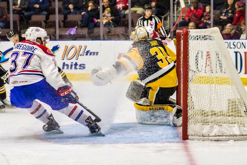 Jason Gregoire of the St. John’s IceCaps looks for a rebound in front of Wilkes-Barre/Scranton Penguins netminder Tristan Jarry during AHL play Saturday night at Mile One Centre. The Pens won 6-2. Photo by Jeff Parsons/St. John’s IceCaps