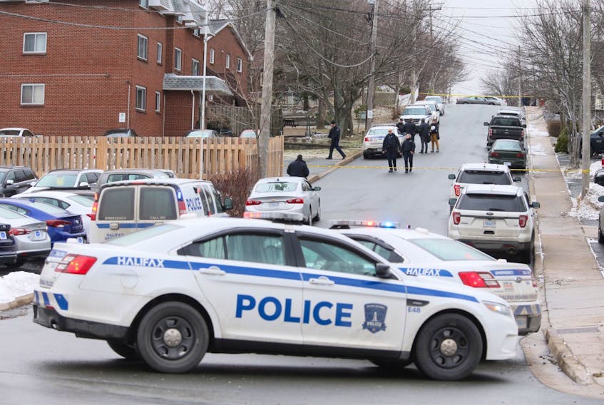 Halifax police block access to the scene of a shooting on Courtney Road in Dartmouth late Tuesday morning. A teenage boy was taken to hospital with non-life-threatening injuries. - Tim Krochak