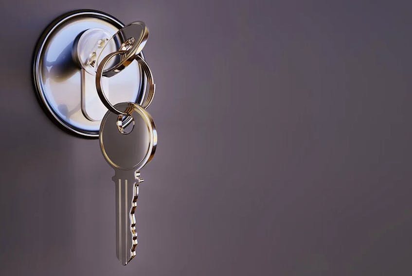 Key in door lock stock photo