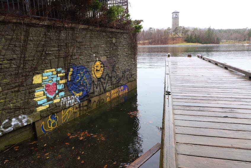 A dock leading into the Northwest Arm at the bottom of Oakland Road Park in south-end Halifax is seen Wednesday, Dec. 2, 2020. Police went to the dock the previous night and charged 12 people with violating COVID-19 restrictions that limit public gatherings to five people.
