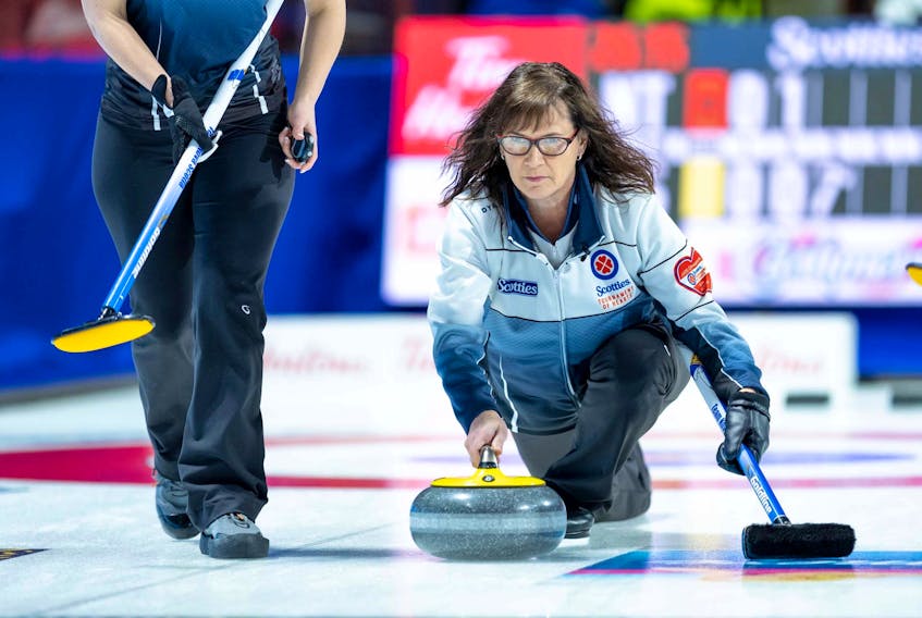 Nova Scotia skip Mary-Anne Arsenault makes a shot during action at the Scotties Tournament of Hearts in Moose Jaw, Sask.  The Nova Scotia rink is 3-1 after action on Monday.  - Andrew Klaver