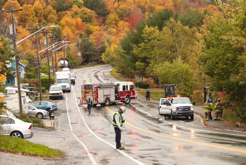 Emergency crews work near the scene of a natural gas leak in the 1200 block of Purcells Cove Road on Thursday, Oct. 22, 2020.