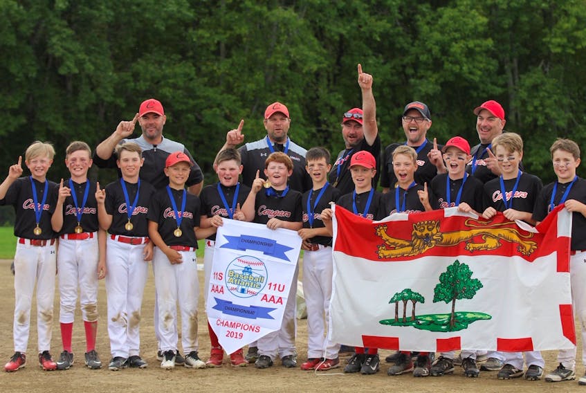 The Mid-Isle Mustangs won the Atlantic mosquito AAA baseball championship Sunday in Fredericton, N.B. Team members, front row, from left, are Drew Watts, Devon Doucette, Gabe Wolfe, Chase Desroches, Dylan Drummond, Rylan MacPhail, Calen Ellsworth, Liam Arsenault, Hunter Crozier, Jax Smallman, Alex Curran and Cam Mckenna. Second row are coaches Scott Ellsworth, Craig Desroches, Corey Watts, Christopher Drummond and Dave MacNeil.