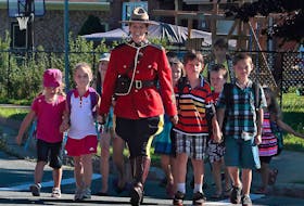 RCMP Const. Heidi Stevenson, who was killed in Sunday's shooting rampage, takes part in an RCMP promotion for crosswalk and school zone safety. This photo was posted to the Nova Scotia RCMP's Facebook page on Sept. 2, 2015