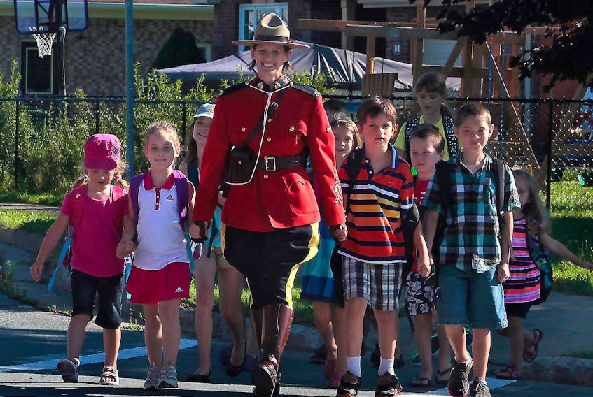 RCMP Const. Heidi Stevenson, who was killed in Sunday's shooting rampage, takes part in an RCMP promotion for crosswalk and school zone safety. This photo was posted to the Nova Scotia RCMP's Facebook page on Sept. 2, 2015