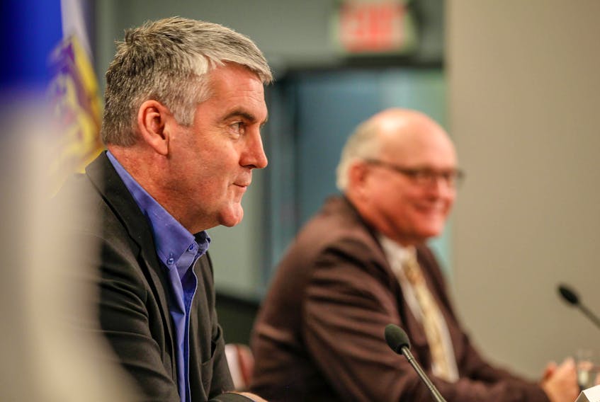 Premier Stephen McNeil and Dr. Robert Strang, Nova Scotia's chief medical officer of health, provide a COVID-19 briefing on Tuesday, Feb. 16, 2021.