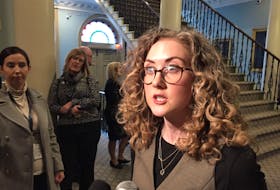 Samantha Hodder, the Nova Scotia Health Authority's senior director of mental health and addictions., speaks with reporters in Halifax on Tuesday, Feb. 11, 2020 outside a meeting of the provincial government's legislative committee on health.