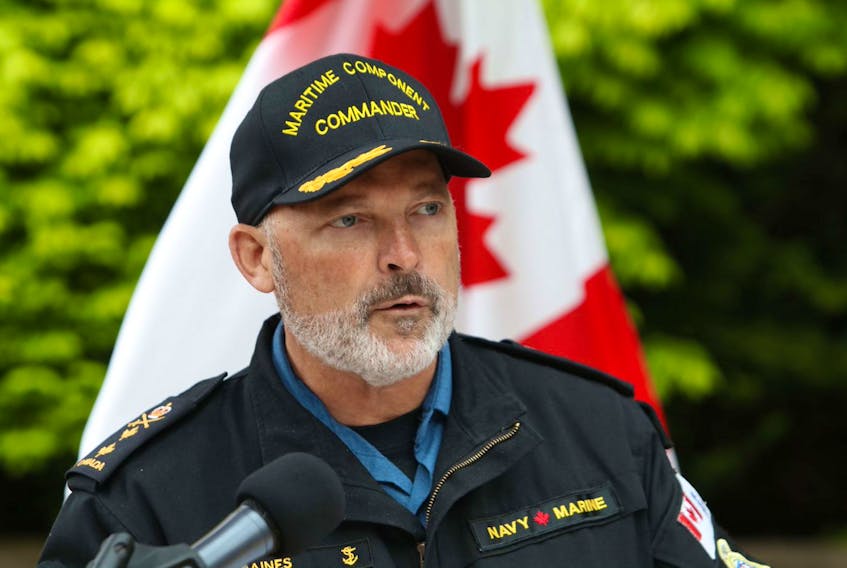 Rear Admiral Craig Baines, Maritime Component commander, speaks at the podium at the Navy Dockyard in Halifax on Wednesday, June 3, 2020. The Royal Canadian Navy and the Royal Canadian Air Force has concluded their recovery efforts of the CH-148 Cyclone and its crew that crashed off the coast of Greece on April 29.