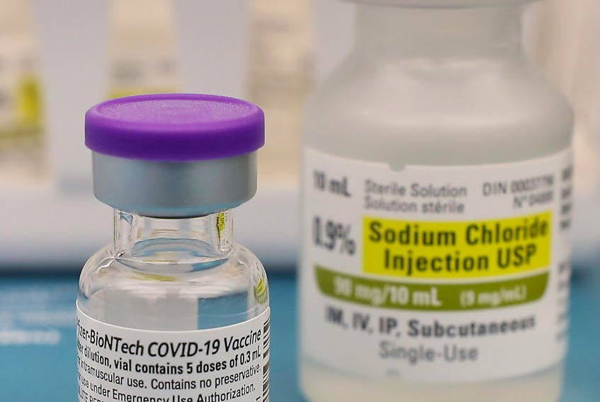A vial of the PFfizer-BioNtech COVID-19 vaccine, part of the first shipment of vaccine to be delivered to Nova Scotia, sits ready for one of the first few hundred people to be inoculated against the virus in Halifax on Dec. 16, 2020.