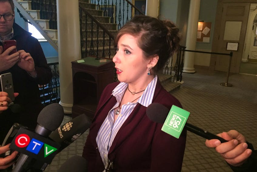 Megan Boudeau is advocating for a proposed NDP law that would ban protests at abortion clinics in the province. She speaks to reporters at Province House on Tuesday, March 3, 2020.