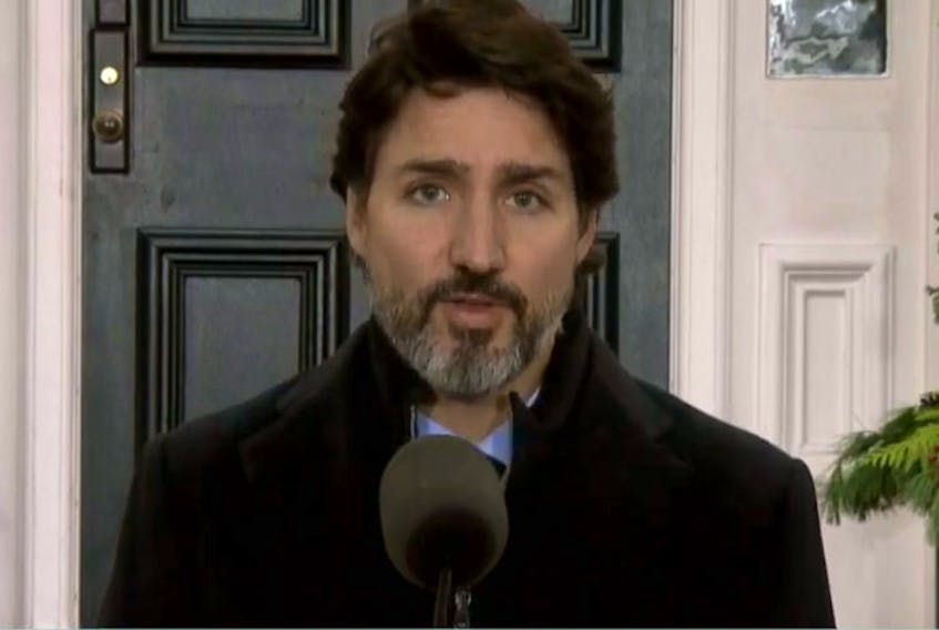 Prime Minister Justin Trudeau speaks to Canadians during a briefing from outside his Rideau Cottage home in Ottawa on Friday, Nov. 20, 2020.