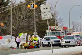 Halifax firefighters and EHS paramedics attend to a pedestrian who was struck in a marked crosswalk on Dunbrack Street at Clayton Park Drive in Halifax Tuesday afternoon, Feb. 18, 2020.
