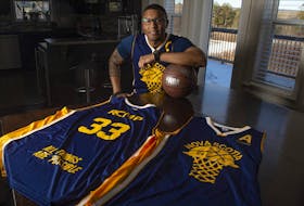 RCMP officer Justin Simmonds poses for a photo in his Beaver Bank home on Wednesday, Feb. 5, 2020. Simmonds is organizing the annual Preston vs. RCMP Basketball Family Day Classic on Feb. 17.