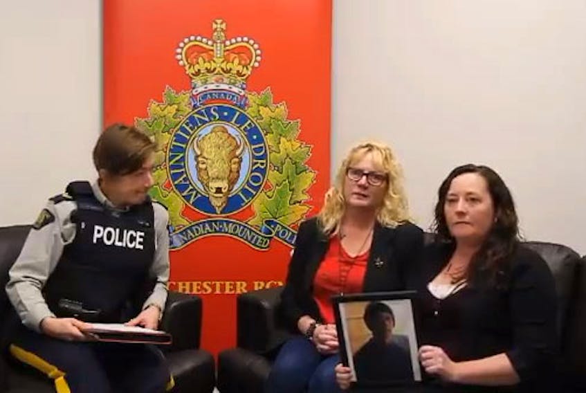 RCMP Cpl. Jennifer Clarke with missing man Tony Walsh's mother, Susan Robben, and his sister, Sarah Walsh-Turner.