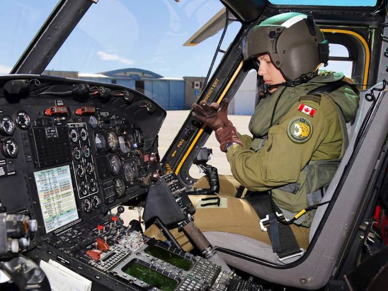 Capt. Stef Pouliot prepares to co-pilot a flight in a CH-146 Griffon helicopter at Canadian Forces Base Trenton, Ont., June 16, 2016. - Luke Hendry / The Intelligencer