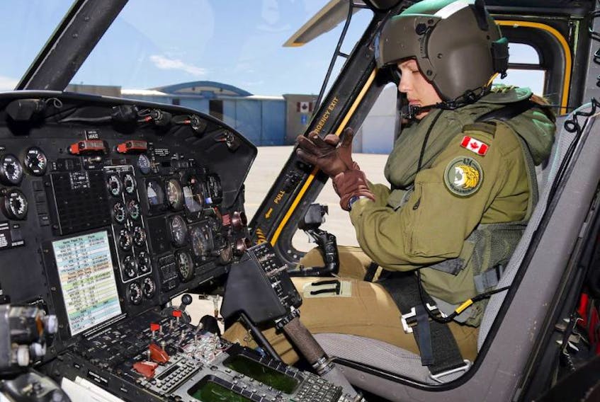 Capt. Stef Pouliot prepares to co-pilot a flight in a CH-146 Griffon helicopter at Canadian Forces Base Trenton, Ont., June 16, 2016. - Luke Hendry / The Intelligencer