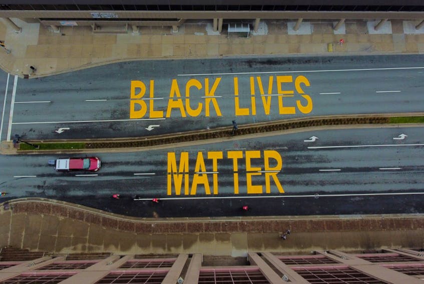 The Black Lives Matter street art that was painted by Halifax Regional Municipality on Alderney Drive, between Queen and Ochterloney streets in Dartmouth, as seen from a drone's-eye view Sunday, Sept. 27, 2020. A similar work appears on Brunswick Street in downtown Halifax.