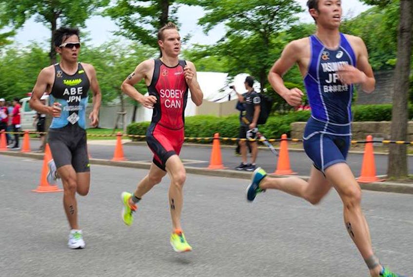Charlottetown’s Martin Sobey, middle, races at the ecent Sprint Triathlon Asian Cup race in Osaka, Japan.
