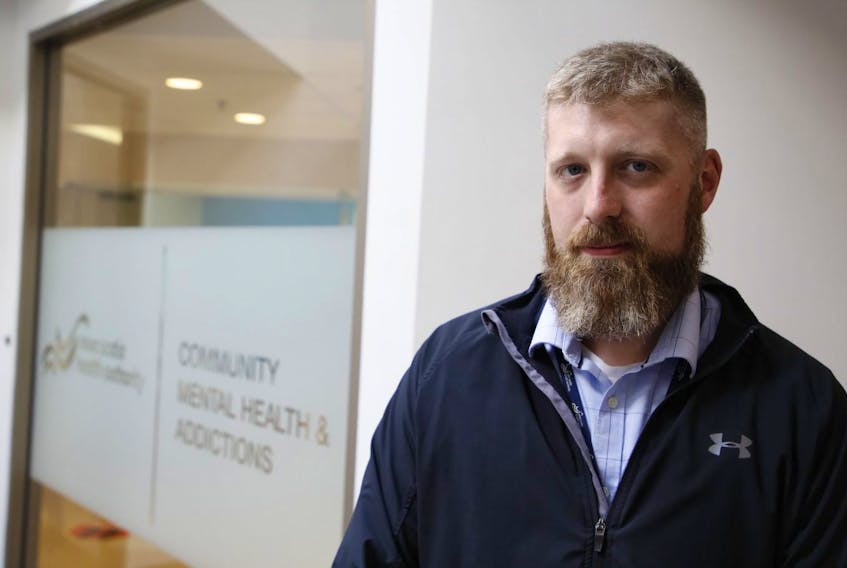 Matt White, the acting program leader of acute care and crisis support at the NSHA central zone. stands outside the community health and addictions office in Halifax on Tuesday, Aug. 18, 2020.