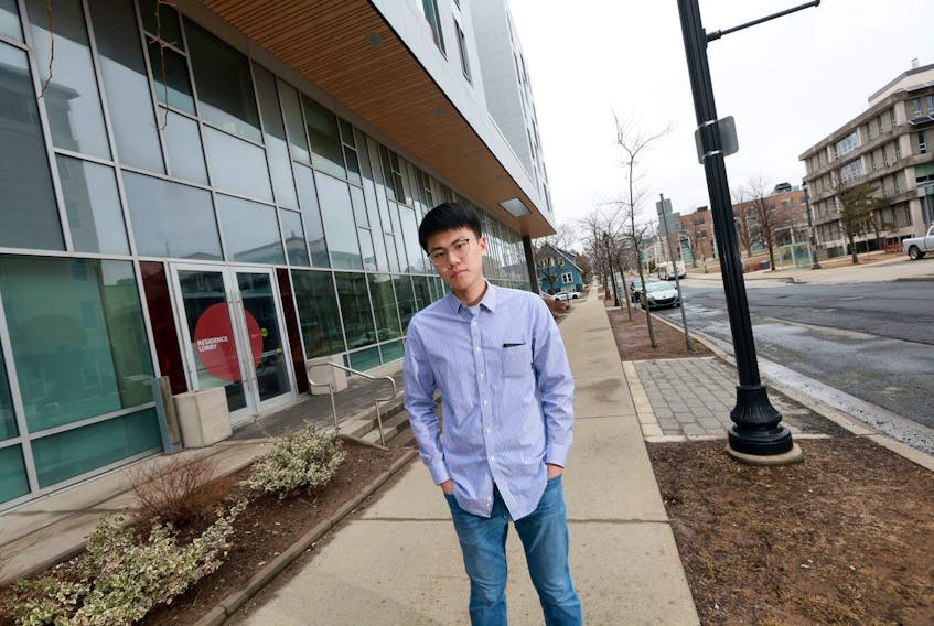 Muyu Lyu, a member of the Dalhousie International Students’ Association, stands on campus Wednesday, April 1, 2020.