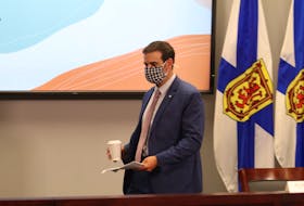Nova Scotia Education Minister Zach Churchill arrives at a news briefing on Friday, Aug. 14, 2020, held to provide an update on back-to-school COVID-19 safety protocols.