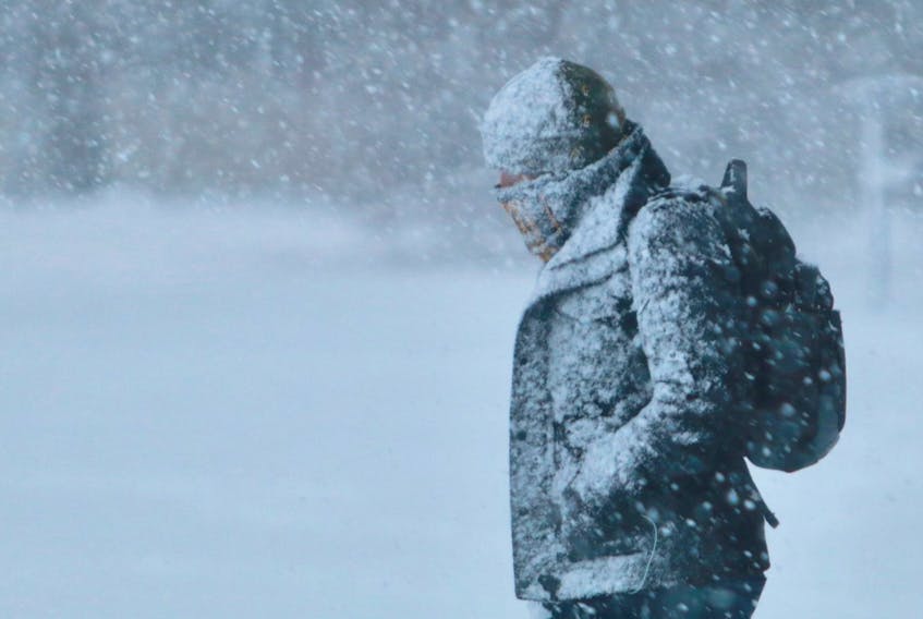A pedestrian trudges through the heavy snowfall Wednesday morning, Jan. 8, 2020 in Halifax.